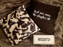 Book club cushions and biscuits sign