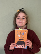 Child with Beetle Boy book.