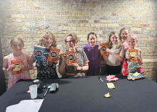 Children with signed books
