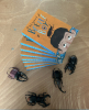 Book, plastic beetles.