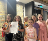 Children with signed books